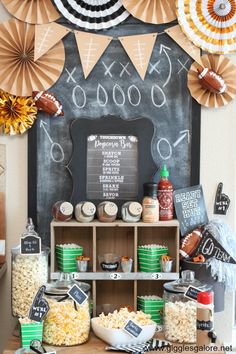 a football themed party with popcorn and decorations