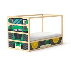 a wooden bed with a green tractor on it