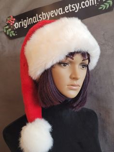 SIZING   This glorious Santa hat will fit 22 inch heads nicely, a little slouchy, and up to larger heads of 24 inches nicely as well.    This hat is made from a gorgeous bright Christmas red faux fur and it is trimmed with a snowy white faux mink fur. The ball on this hat is a bit bigger, and is attached right at the end of the hat. No string showing, yet it still has a nice movement to it. The brim is cut extra generously so it can be cuffed down for added fullness. And it is a nice long length Stocking Hat, Bright Christmas, White Faux Fur, Cute Hats, Christmas Red, Mink Fur, Bubblegum Pink, White Trim, Classic Christmas