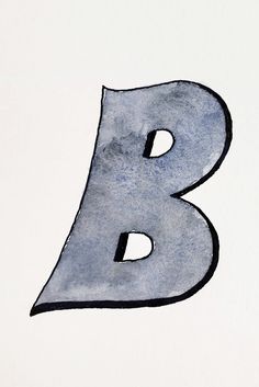 the letter b is painted in blue and black on a white paper with watercolor pencils