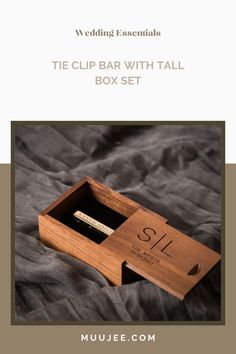 a wooden box with a pen in it and the text wedding essentials, the clip bar with tall box set