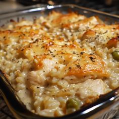 a casserole dish with chicken and vegetables in it