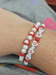 Set of 2 stretchy bracelets.  Letter beads are heart shaped.   Items are ready to ship.  You will receive the item pictured.  Bracelets measure approximately 7.5 inches. Bracelets Letter Beads, Heart-shaped Letter Beads Bracelet Gift, Trendy Heart-shaped Bracelet With Letter Beads, Heart-shaped Letter Beads Bracelet, Red Heart-shaped Beaded Bracelets With Letter Beads, Playful Heart-shaped Letter Beads Bracelet, Reader Girl, Girls Cup, Cup Sleeves