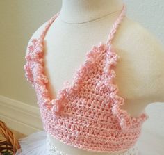 "This pretty pink crop top is a beautiful addition to your little ones wardrobe. Crochet toddler crop top with open back, is super cute when paired with a tutu, skirt, shorts leggings or jeans. Pretty for parties, beach days, or for that special dress-up day. Sizes: Available options in drop down menu. Item Shown: Size: 2t Top: Bust - 21\" Material: synthetic yarn Also available in 100% cotton yarn button (button may not be the same as shown on item) Care: Machine wash warm. Tumble dry on low setting. Send message for more info about this item. All items are created in a smoke free and pet free environment." Crochet Shirt Pattern, Pink Crochet Top, Crochet Bra Top, Crochet Shirts, Toddler Crochet, Shirts Pattern, Crochet Tank Tops, Crochet Bra, Yarn Gifts