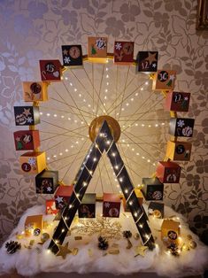 a ferris wheel decorated with lights and decorations