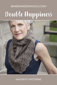 a woman wearing a knitted scarf with the words double happiness written in front of her