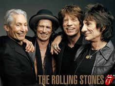 the rolling stones posing for a photo together