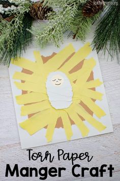 a paper sun craft with text overlay that reads, torn paper manger craft