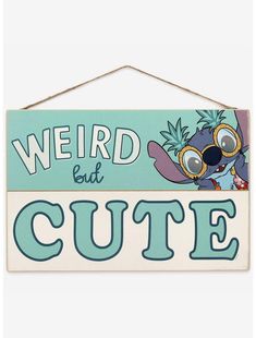 a sign that says weird but cute