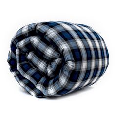 a blue and white checkered comforter on a grey background with the top rolled up