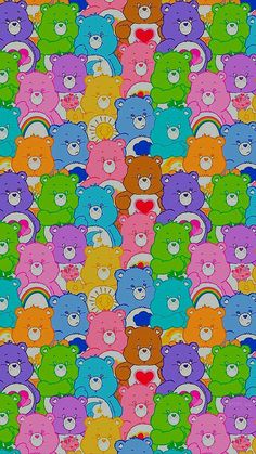 a multicolored bear pattern with hearts and rainbows on the bears is shown