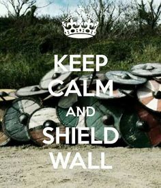 there is a pile of barrels with the words keep calm and shield wall