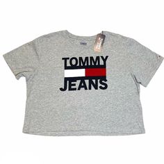 Nwt Tommy Jeans Tommy Hilfiger Cotton Crop Top Tee Gray T-Shirt Size: M Flat Measurements: Front- From Shoulder To Bottom Hem Approx. 19” (Front Length Slightly Shorter Than Back Length) Trendy Gray Tops With Logo Print, Tommy Hilfiger Tops With Logo Print For Spring, Tommy Hilfiger Tops With Letter Print For Summer, Spring Tommy Hilfiger Tops With Logo Print, Tommy Hilfiger Spring Tops With Logo Print, Tommy Hilfiger Graphic Tee With Letter Print, Tommy Hilfiger Graphic Print Tops For Spring, Trendy Tommy Hilfiger Tops With Graphic Print, Tommy Hilfiger Casual Crew Neck Tops