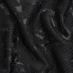 the black fabric is very soft and has an interesting pattern on it's surface