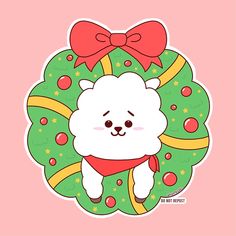 a white bear with a red bow on it's head sitting in front of a wreath