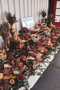 a table filled with lots of different types of food