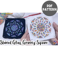 the finished glass granny square is being held up by two hands with yarn and crochet