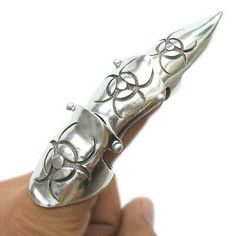 Biohazard Finger Armor | ShopLook Full Finger Rings Silver, Finger Armor Ring, Prosthetic Fingers, Sharp Jewelry, Armor Rings, Finger Armor