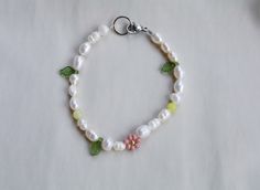 Pearl bracelet is handmade from the best materials. You can buy a sunflower bracelet as a gift for a friend, sister, or mother. MATERIALS of daisy flower bracelet: Pearls, pink pearl, seed beads, rose quartz heart and an extender chain (not in the picture). ALSO AVAILABLE AS A NECKLACE. SO YOU CAN A BUY A JEWELRY SET. https://www.etsy.com/listing/1276098651/lavender-beaded-flower-necklace-pearl SIZE of beaded bracelet : The Length is adjustable. A chain is added to each bracelet for additional c Handmade Pearl Bracelet With Round Beads For Spring, Handmade Pearl Bracelet For Spring, Delicate Flower Charm Bracelet For Spring, Daisy Flower Charm Bracelets As Gift, Daisy Flower Charm Bracelet For Gift, Pink Flower Pearl Bracelet Gift, Adjustable Pearl Bracelet With Flower Shape, Adjustable Flower Pearl Bracelets, Adjustable Flower-shaped Pearl Bracelets