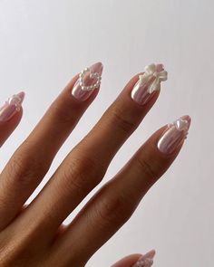 The 2024 Nail Trends You Need to Try Out for Yourself Trending Simple Nails, Pink Nail Charm Designs, Gel Nail Designs With Charms, Pretty Pink Gel Nails, Hens Party Nails, Nails Ideas Charms, Nails Pearls Design, Simple Nails With Charms, Chrome Nails With Charms