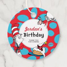 a birthday ornament with the cat in the hat on it