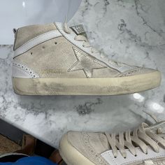 Golden Goose Mid Star Classic, Suede Upper Toe, Seed Pearl/Platinum Is Color, Fur Inside, Sz 36, Only Worn Twice. Like Brand New Gold High-top Sneakers With Round Toe, Leather High-top Sneakers With Speckled Midsole, Golden Goose Mid Star, Golden Goose Mid, Shoes Golden Goose, Short Faux Fur Jacket, Nike Acg Jacket, Leopard Print Jacket, Canvas Jacket