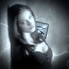 a woman holding an envelope with lightning in the background