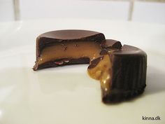 two pieces of chocolate on a white plate