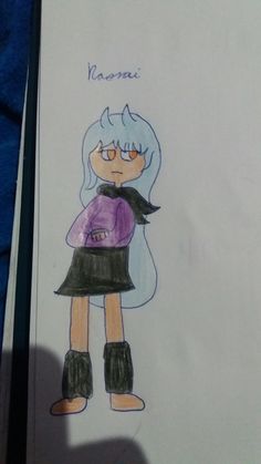 a drawing of a girl with blue hair and black boots is shown in front of a piece of paper