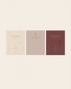 three booklets with the words maha on them in red, white and brown