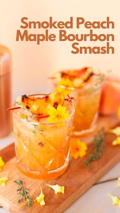 smoked peach maple bourbon smash on a cutting board