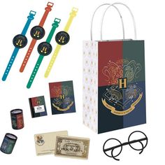 a harry potter gift set with glasses, watch, money and other items to make it look like the hogwart's house