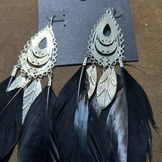 Ladies’ Silver Dangle Earrings W/Black Feathers Colorful Feathers, Silver Feather, Silver Dangle Earrings, Black Feathers, Dangly Earrings, Silver Earrings Dangle, Black Silver, Feathers, Silver Earrings