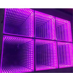 purple led panel with square holes in the center and four squares on each side, all lit up