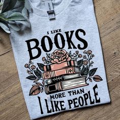 Super Cute Tee. On Gildan Adult Unisex 50/50 Ash Grey Tee Shirt. Made With Sublimation. Ships Within 3 Business Days. Book Inspired Shirts, Book Lover Shirt, Statement Sweaters, The 1975 T Shirt, People Humor, Purple Crewneck, Summer Tee Shirts, Trendy Shirt Designs, Jesus Tshirts