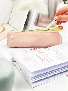 Perfect for stationery lovers, our blush pink pencil case is a must-have desk accessory for keeping your workspace tidy. Whether you're upgrading your stationery storage at the office or need a new back to school pencil case, this luxury pen pouch combines both elegance and functionality. Individually handcrafted from soft vegan leather, complete with an inner lining for durability. - Holds 10-15 pens or pencils - Slim shape - Approx. 20cm in length - Ideal new job gift for a friend - Blush Pink Pencil Case Photography, Pink Organizers For Everyday Use And Back To School, Pink Stationery With Pen Slots For Organization, Portable Pink Stationery For Organization, Pink Portable Organizer For Personal Use, Pink Rectangular Organizer With Pen Holders, Pink Rectangular Organizers With Pen Holders, Pink Cosmetic Bag With Pen Slots For Daily Use, Pink Stationery With Pen Slots