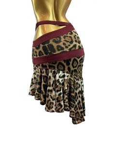 a mannequin wearing a leopard print skirt