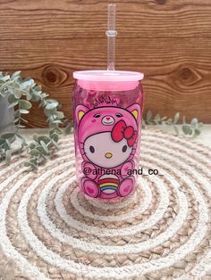 the hello kitty tumbler cup has a straw in it