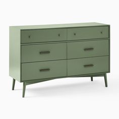 a green dresser with four drawers and two handles on each drawer, in front of a white background