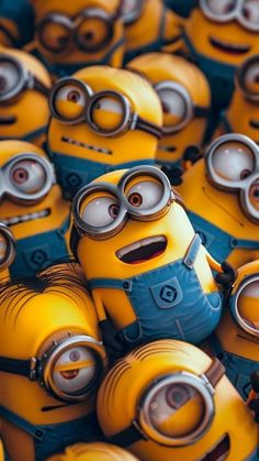 many small yellow and black minion toy figures in the shape of minions from despicables