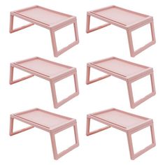 six pink coffee tables sitting next to each other