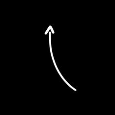 an arrow drawn in white on a black background