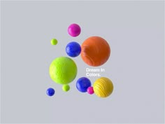 colorful balls floating in the air with words dream in colors above them on a gray background