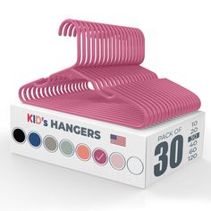 the pink hangers are in a box