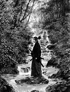 two people are standing in the woods near a stream with rocks and water flowing down it