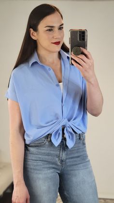 Details: This collared airflow button up top is so soft, lightweight and comfortable. It’s very versatile and can be dressed up or down! The airflow material is one of our favorites because it washes well and looks elevated, but also has some stretch. Wear it buttoned or unbuttoned. You can tuck it, wear it part tucked, or tied. It has a flowy fit, side slits, and a fabulous length! Loving this color paired with a pop of red. Materials: 100% Polyester Made In: China Sizing Tip: Order True to Size. If in between you can size down. I am about 5'7 165 pounds and a 34B, and I am generally S/M top. I am wearing the Small. It has a nice flowy fit. It is a little more fitted on the sleeve, but not tight. Pop Of Red, Dolman Top, Color Pairing, Button Up Top, Button Downs, Button Up, Light Blue, Dress Up, China