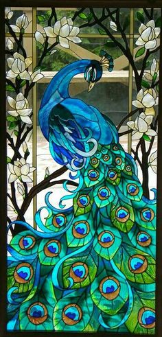 a stained glass window with a peacock on it's back and flowers in the background