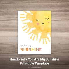 a card with the words, you are my sunshine and a handprint sun on it