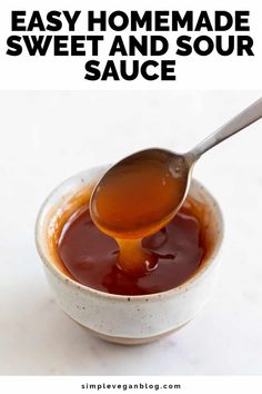 a spoon full of homemade sweet and sour sauce in a white bowl with text overlay that reads easy homemade sweet and sour sauce