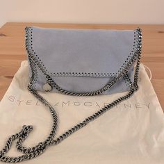 Cross Body Summer Blue Bag From Stella Mccartney. Excellent Condition Light Weight Inside Is Clean With No Stains And The Bag Have No Scratches Designer Light Blue Shoulder Bag For Evening, Blue Clutch Evening Bag With Dust Bag, Designer Blue Bag With Chain Strap, Blue Cross Body Bag, Blue Cross, Summer Blue, Cross Body Bag, Blue Bags, Bago